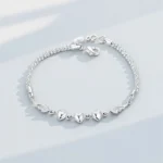 Stylish Silver-Plated Minimalist Heart-and-Feather Bracelet For Women - Image 2